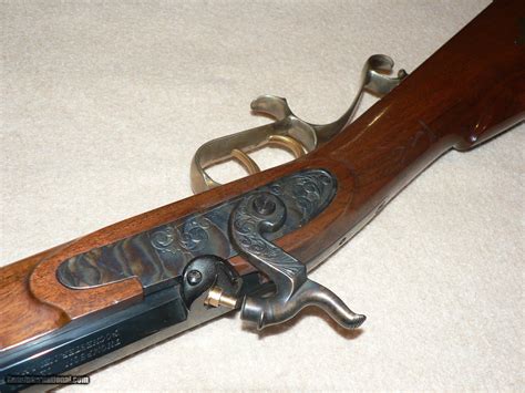 The barrel retains about 96% original blue with light oxidation near the muzzle and nipple, a light abrasion behind the front sight, and. . Thompson center 45 caliber muzzleloader